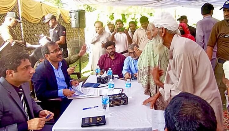 Bahawalnagar DC Syed Muhammad Abbas listening to citizens’ complaints at an open court in Chishtian